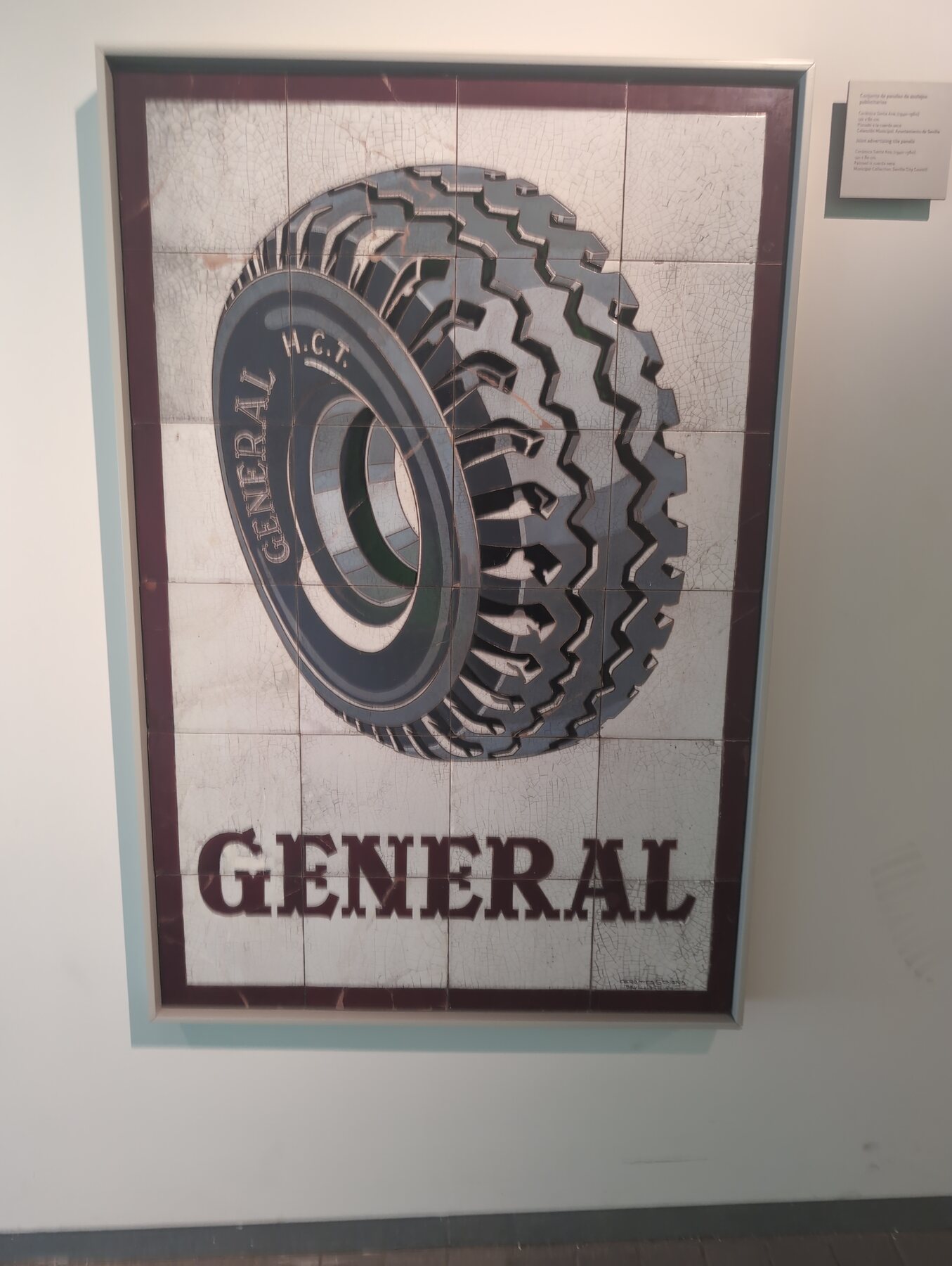 A General tire advertisement made from ceramic tiles at Centro Cerámica Triana